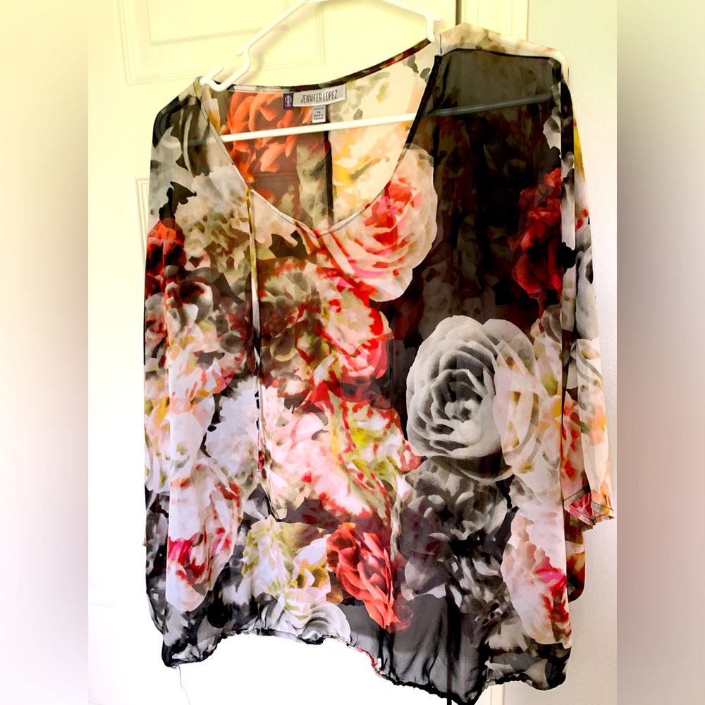 Beautiful sheer top.